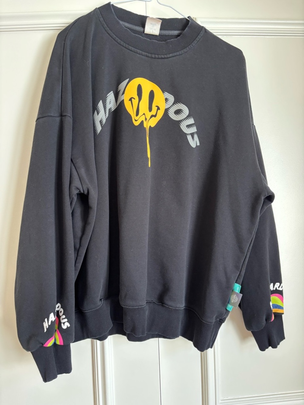 Black Graphic Crewneck Sweatshirt with Yellow Drip Smile